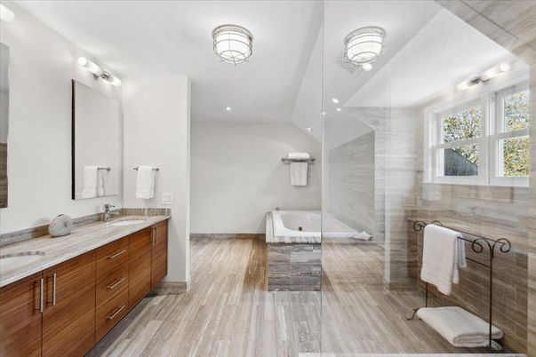 Bathroom, Dual Sink Vanities, Glass Shower, Interior, Recessed Lighting, Wood Texture Flooring
