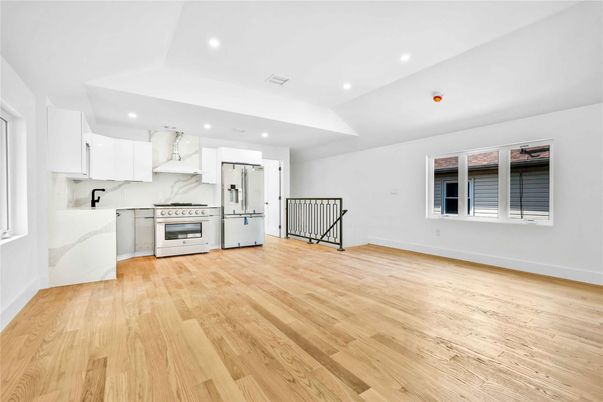 Interior, Kitchen, Marble Walls, Recessed Lighting, Stainless Steel Appliances, Wood Texture Flooring