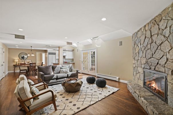 Dining room, Fireplace, Interior, Living room, Pendant Lights, Recessed Lighting, Stone Walls, Wood Texture Flooring