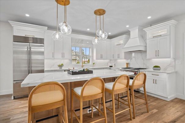 Interior, Kitchen, Marble Walls, Pendant Lights, Recessed Lighting, Stainless Steel Appliances, Wood Texture Flooring