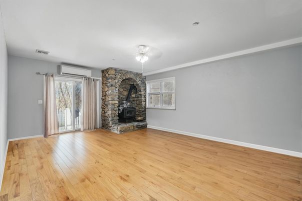 Empty room, Fireplace, Interior, Stone Walls, Wood Texture Flooring