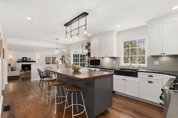 Dining room, Fireplace, Interior, Kitchen, Living room, Pendant Lights, Recessed Lighting, Stainless Steel Appliances, Wood Texture Flooring