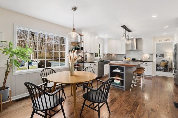 Dining room, Interior, Kitchen, Pendant Lights, Recessed Lighting, Stainless Steel Appliances, Wood Texture Flooring