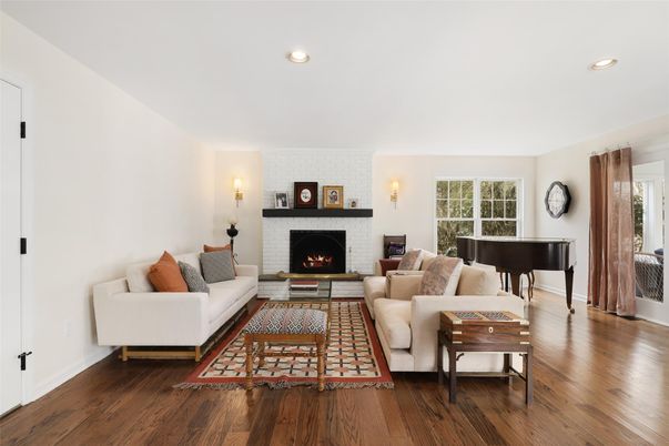 Fireplace, Interior, Living room, Piano, Recessed Lighting, Wood Texture Flooring