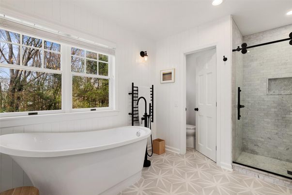 Bathroom, Free Standing Baths, Glass Shower, Interior, Recessed Lighting, Stone Walls