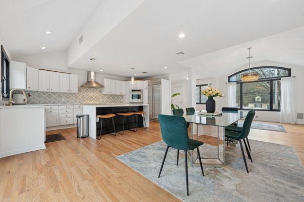 Dining room, Interior, Kitchen, Pendant Lights, Recessed Lighting, Stainless Steel Appliances, Wood Texture Flooring