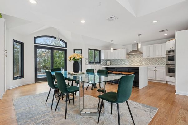 Dining room, Interior, Kitchen, Pendant Lights, Recessed Lighting, Stainless Steel Appliances, Wood Texture Flooring