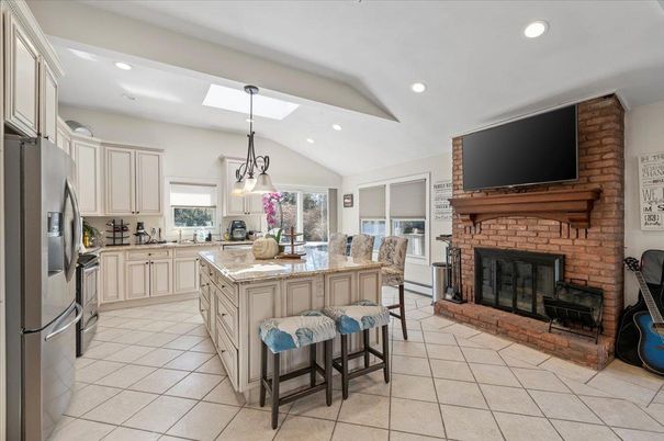 Fireplace, Interior, Kitchen, Pendant Lights, Recessed Lighting, Stainless Steel Appliances