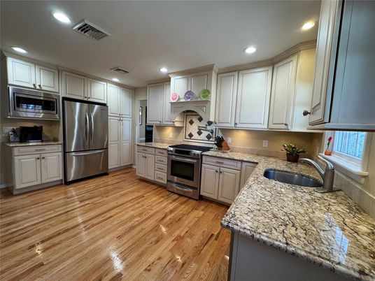 Interior, Kitchen, Recessed Lighting, Stainless Steel Appliances, Wood Texture Flooring