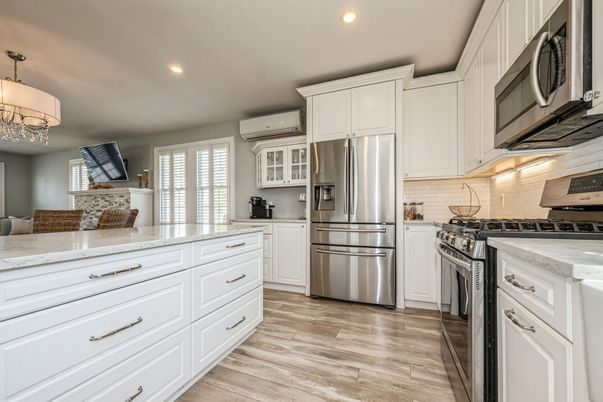 Chandelier, Interior, Kitchen, Recessed Lighting, Stainless Steel Appliances, Wood Texture Flooring