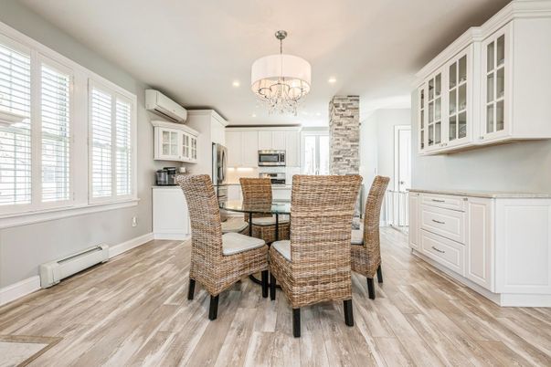 Chandelier, Dining room, Interior, Kitchen, Recessed Lighting, Stainless Steel Appliances, Wood Texture Flooring