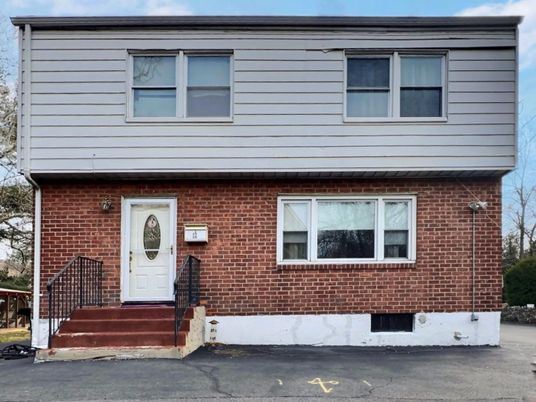 Exterior, Facade, Brick Facade, Raised Ranch