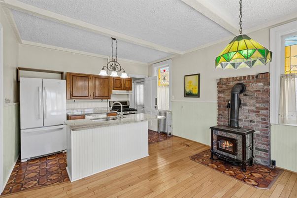 Fireplace, Interior, Kitchen, Pendant Lights, Stone Walls, Wood Texture Flooring