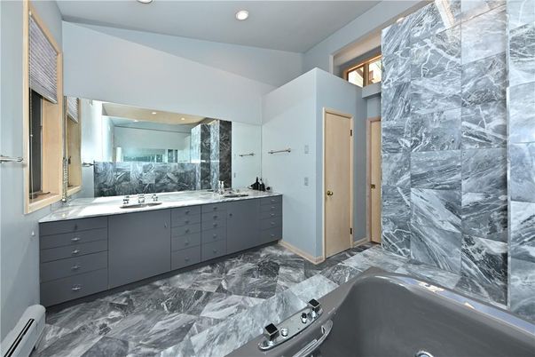 Bathroom, Dual Sink Vanities, Free Standing Baths, Interior, Marble, Marble Walls, Recessed Lighting