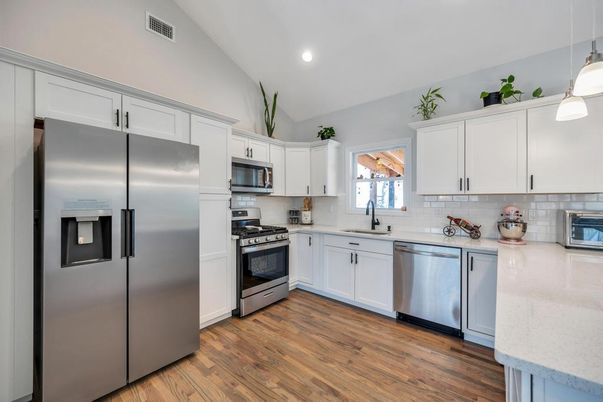 Interior, Kitchen, Pendant Lights, Recessed Lighting, Stainless Steel Appliances, Wood Texture Flooring