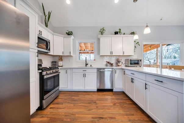 Interior, Kitchen, Pendant Lights, Recessed Lighting, Stainless Steel Appliances, Wood Texture Flooring