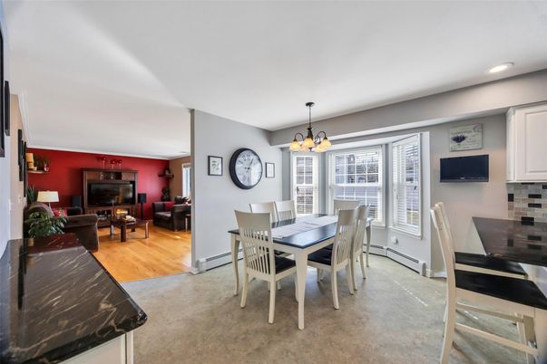 Chandelier, Dining room, Fireplace, Interior, Living room, Recessed Lighting, Wood Texture Flooring