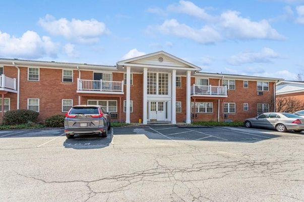 Exterior, Facade, Brick Facade, Condo Building