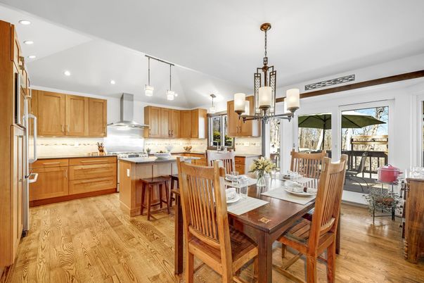 Dining room, Interior, Kitchen, Pendant Lights, Recessed Lighting, Stainless Steel Appliances, Wood Texture Flooring