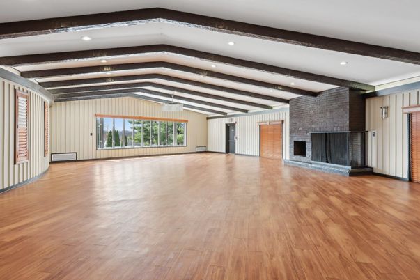 Empty room, Fireplace, Interior, Recessed Lighting, Stone Walls, Wooden Beams, Wood Texture Flooring