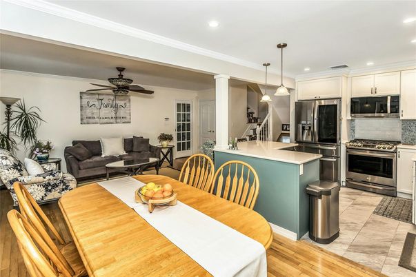 Dining room, Interior, Kitchen, Living room, Pendant Lights, Recessed Lighting, Stainless Steel Appliances, Wood Texture Flooring