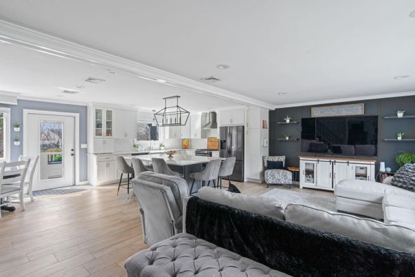 Dining room, Interior, Kitchen, Living room, Pendant Lights, Recessed Lighting, Stainless Steel Appliances, Wood Texture Flooring