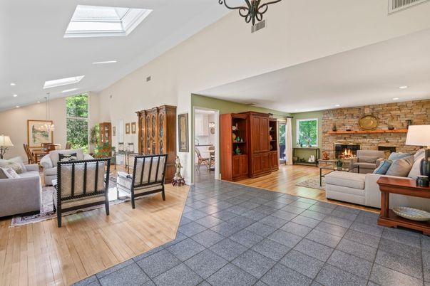 Fireplace, Interior, Living room, Pendant Lights, Recessed Lighting, Stone Walls, Wood Texture Flooring