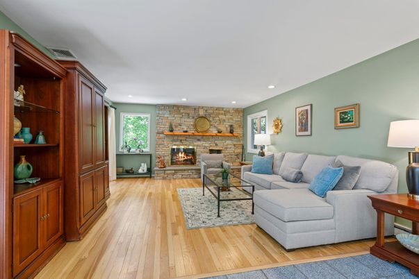 Fireplace, Interior, Living room, Recessed Lighting, Stone Walls, Wood Texture Flooring