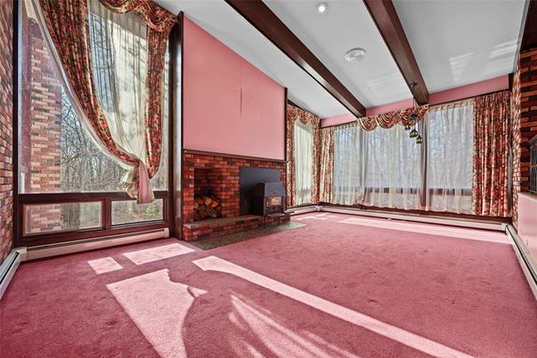 Empty room, Fireplace, Interior, Recessed Lighting, Stone Walls, Wooden Beams