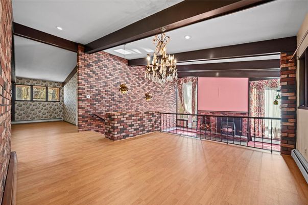 Chandelier, Fireplace, Interior, Recessed Lighting, Stone Walls, Wooden Beams, Wood Texture Flooring