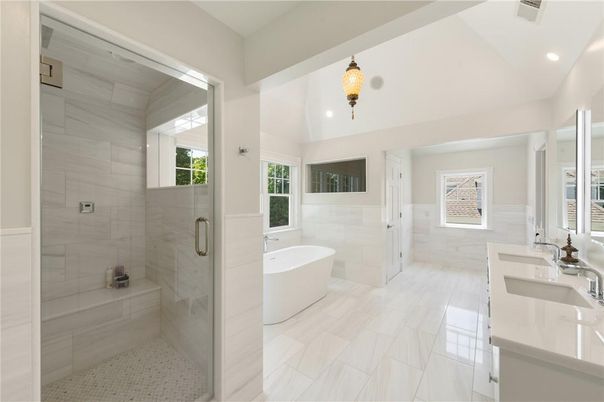 Bathroom, Dual Sink Vanities, Free Standing Baths, Glass Shower, Interior, Marble Walls, Recessed Lighting