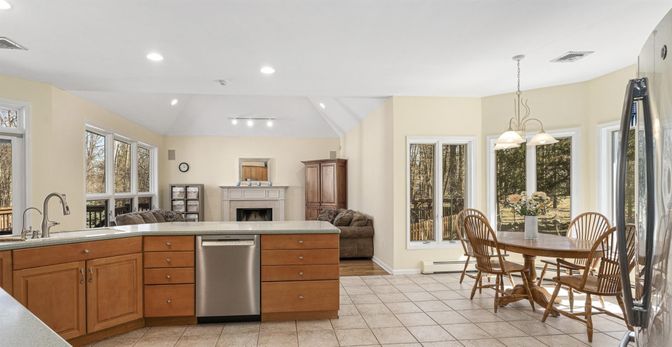 Dining room, Fireplace, Interior, Kitchen, Pendant Lights, Recessed Lighting, Stainless Steel Appliances
