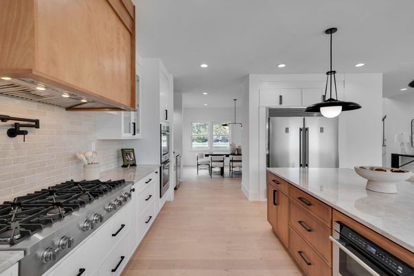 Dining room, Interior, Kitchen, Pendant Lights, Recessed Lighting, Stainless Steel Appliances, Wood Texture Flooring
