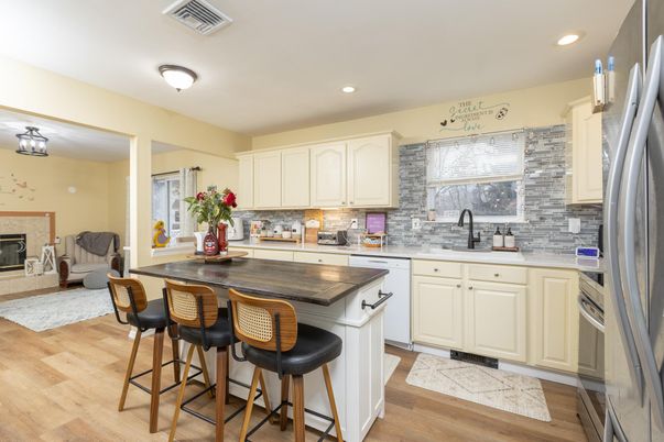 Fireplace, Interior, Kitchen, Recessed Lighting, Wood Texture Flooring