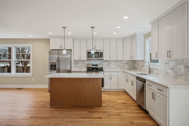 Interior, Kitchen, Pendant Lights, Recessed Lighting, Stainless Steel Appliances, Wood Texture Flooring