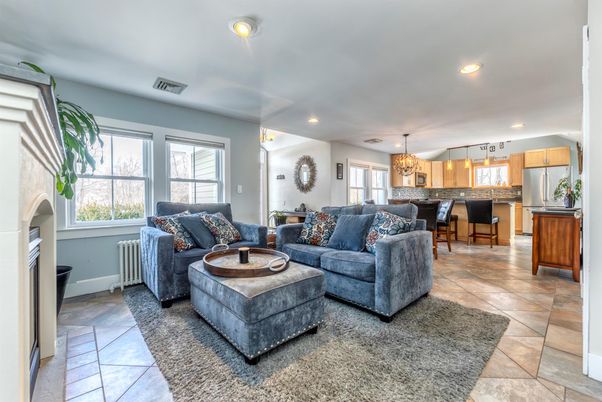 Chandelier, Fireplace, Interior, Kitchen, Living room, Pendant Lights, Recessed Lighting, Stainless Steel Appliances