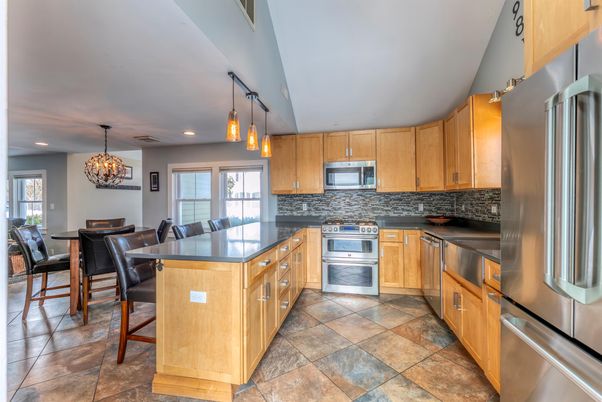 Chandelier, Dining room, Interior, Kitchen, Pendant Lights, Recessed Lighting, Stainless Steel Appliances