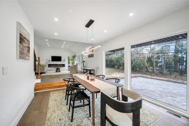 Dining room, Fireplace, Interior, Living room, Pendant Lights, Recessed Lighting, Wood Texture Flooring