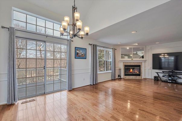 Chandelier, Empty room, Fireplace, Interior, Recessed Lighting, Wood Texture Flooring