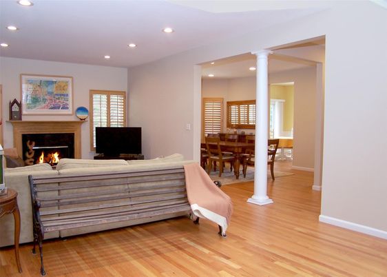 Dining room, Fireplace, Interior, Living room, Recessed Lighting, Wood Texture Flooring