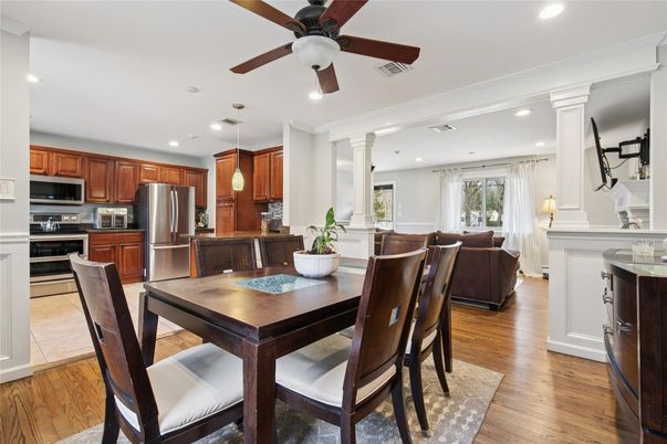 Dining room, Interior, Kitchen, Pendant Lights, Recessed Lighting, Stainless Steel Appliances, Wood Texture Flooring