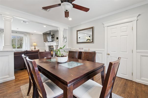 Dining room, Fireplace, Interior, Living room, Recessed Lighting, Wood Texture Flooring