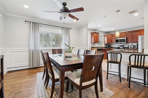 Dining room, Interior, Kitchen, Pendant Lights, Recessed Lighting, Stainless Steel Appliances, Wood Texture Flooring