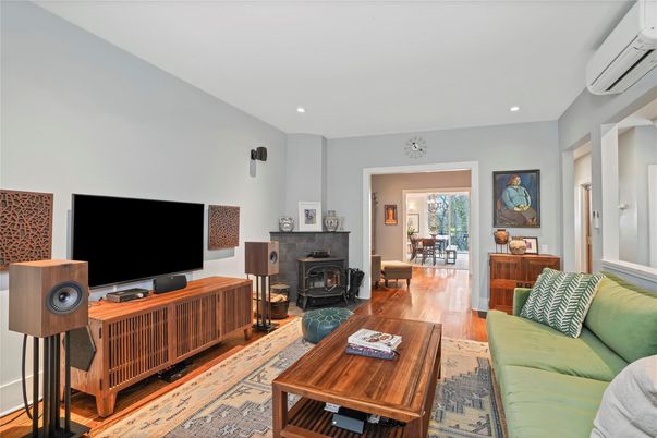 Dining room, Fireplace, Interior, Living room, Recessed Lighting, Wood Texture Flooring