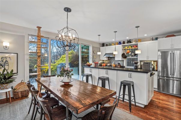 Chandelier, Dining room, Interior, Kitchen, Pendant Lights, Recessed Lighting, Stainless Steel Appliances, Wood Texture Flooring