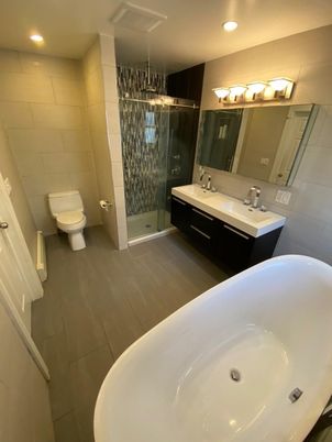 Bathroom, Dual Sink Vanities, Free Standing Baths, Interior, Recessed Lighting, Wood Texture Flooring