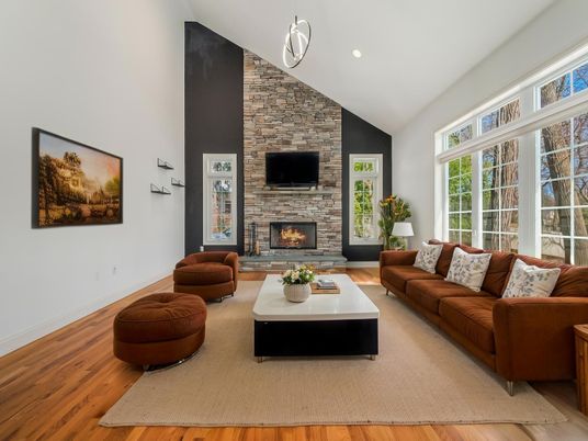 Fireplace, Interior, Living room, Recessed Lighting, Stone Walls, Wood Texture Flooring