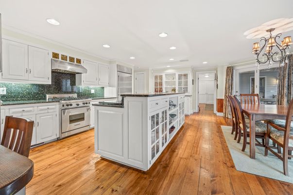Chandelier, Dining room, Interior, Kitchen, Recessed Lighting, Stainless Steel Appliances, Wood Texture Flooring