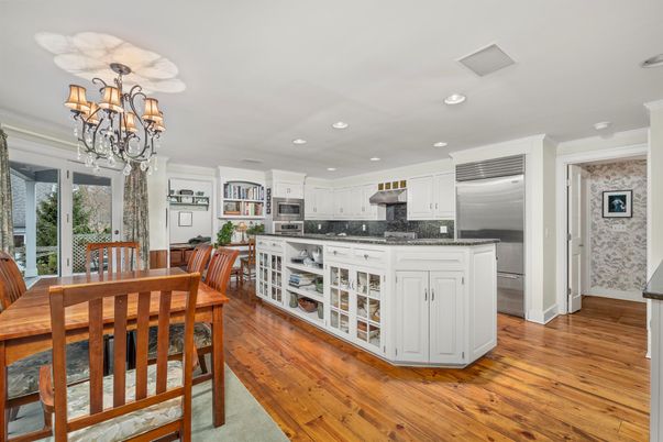 Chandelier, Dining room, Interior, Kitchen, Recessed Lighting, Stainless Steel Appliances, Wood Texture Flooring