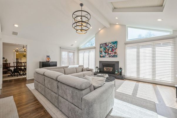 Dining room, Fireplace, Interior, Living room, Pendant Lights, Recessed Lighting, Wood Texture Flooring